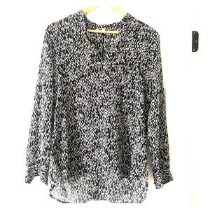 Long sleeve business casual work shirt.